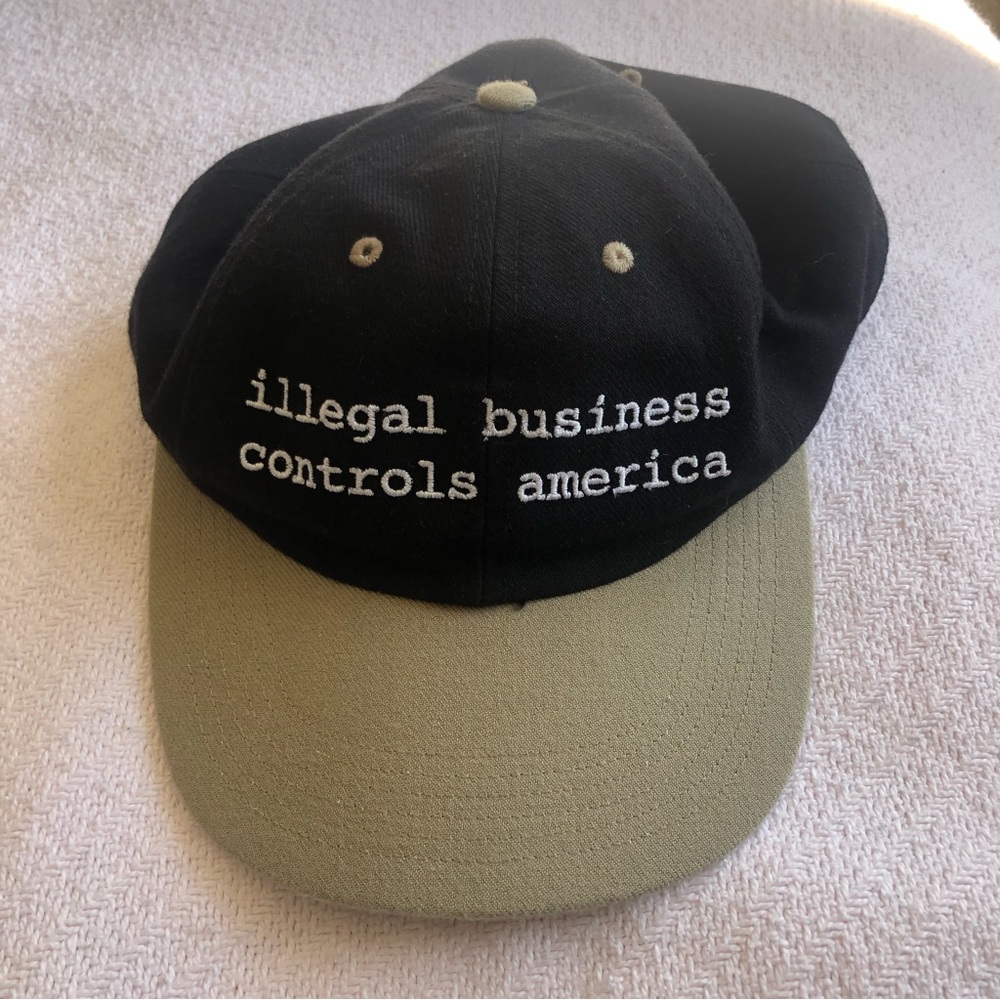 Supreme “illegal business controls America” hat